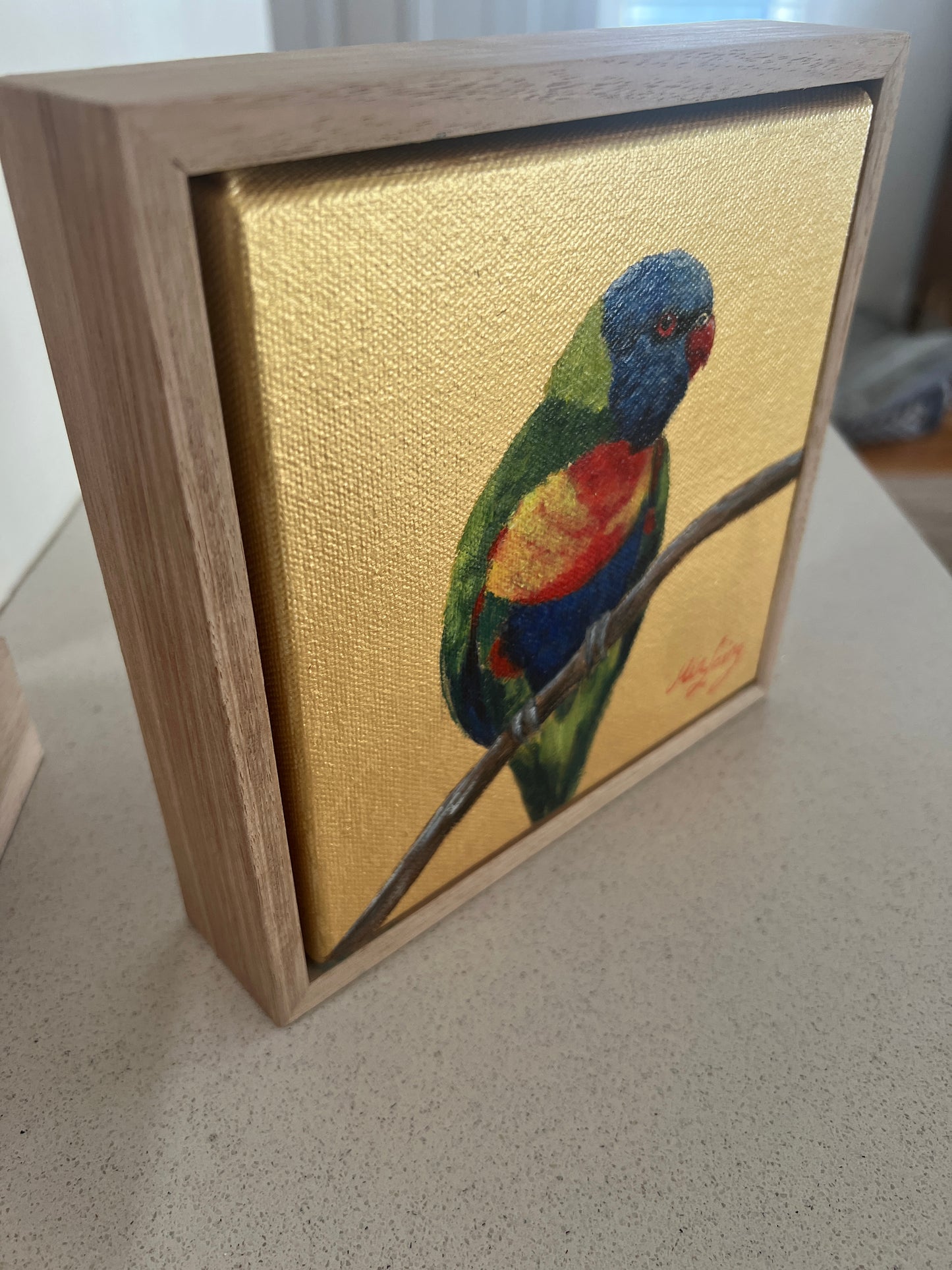 Golden rainbow Lorikeet